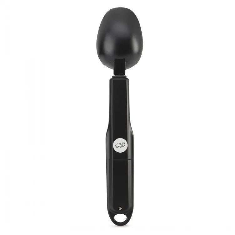Digital measuring spoon with LCD display showing weight measurement