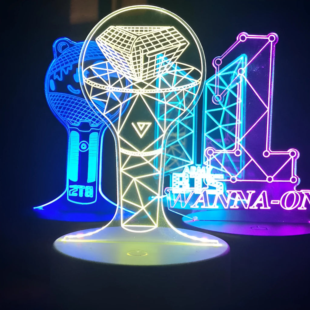 BTS-themed acrylic light-up display stand holding BTS Light 101 Tower Gem collectible