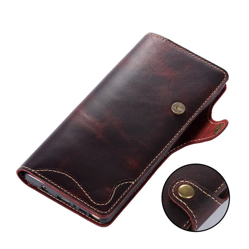 Handmade leather mobile phone case with wallet compartment open showing card slots