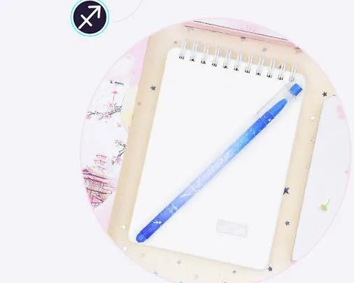 Box containing 12 constellation-themed plastic gel pens with quick-drying ink