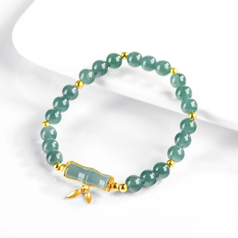Women's high-rise bracelet made of S925 silver with blue water round beads.