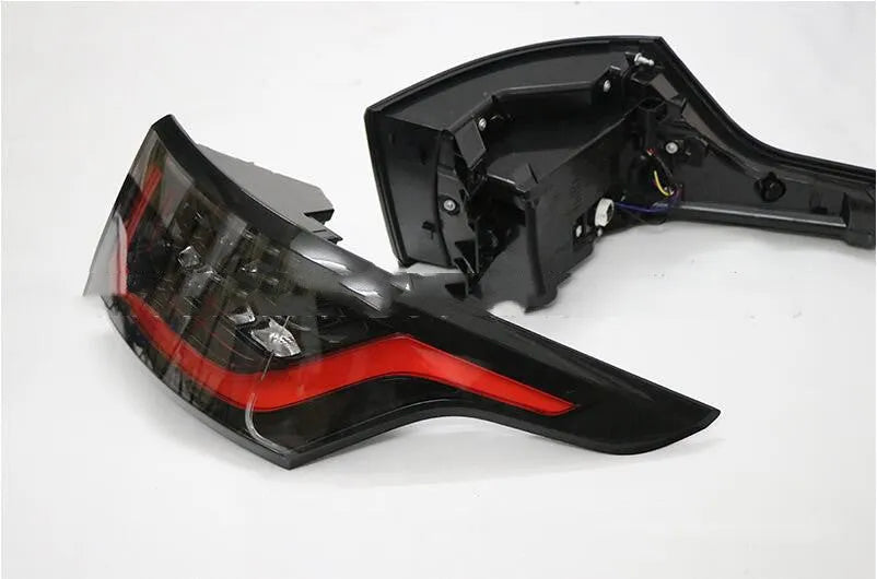 A pair of LED car brake light assemblies for the rear bumper