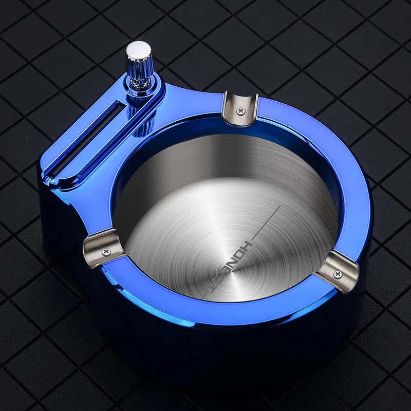 Large metal ashtray with sliding permanent match lighter and three fixed cigarette slots in blue colour