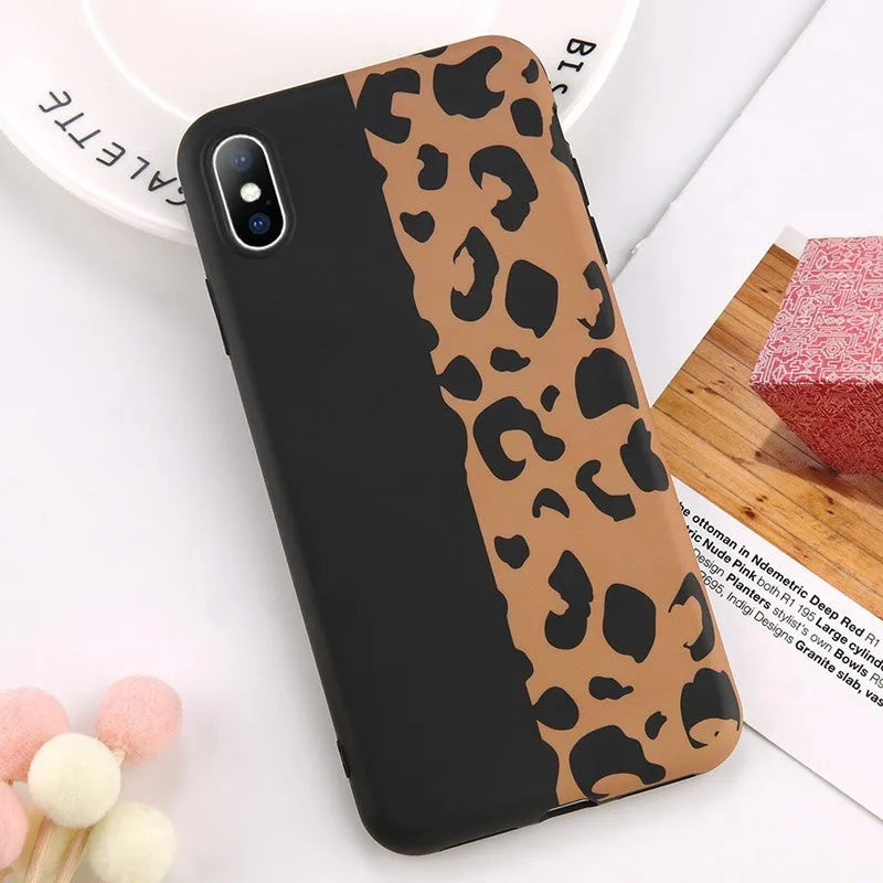 Leopard print pattern phone case for iPhone shown in black, blue, and pink colour options.
