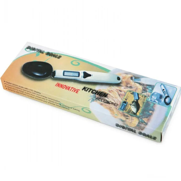 Digital measuring spoon with LCD display showing weight measurement