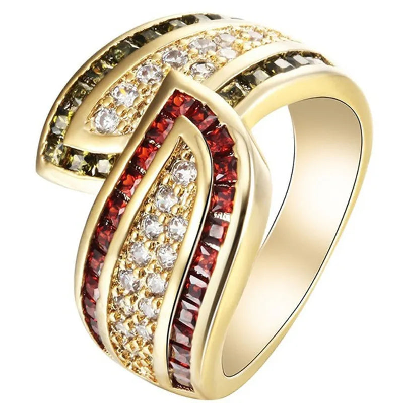 Gold-coloured women's alloy ring with a central green peridot stone on a model's finger.