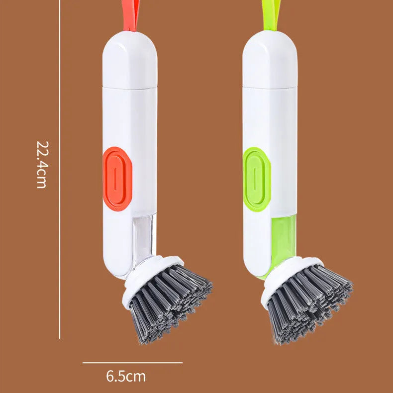Long-handle kitchen cleaning brush with integrated soap dispenser and two removable brush heads, in white and red colour option.