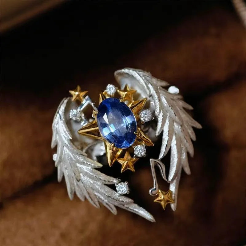 Adjustable geometric angel wings ring with open mouth design in alloy metal