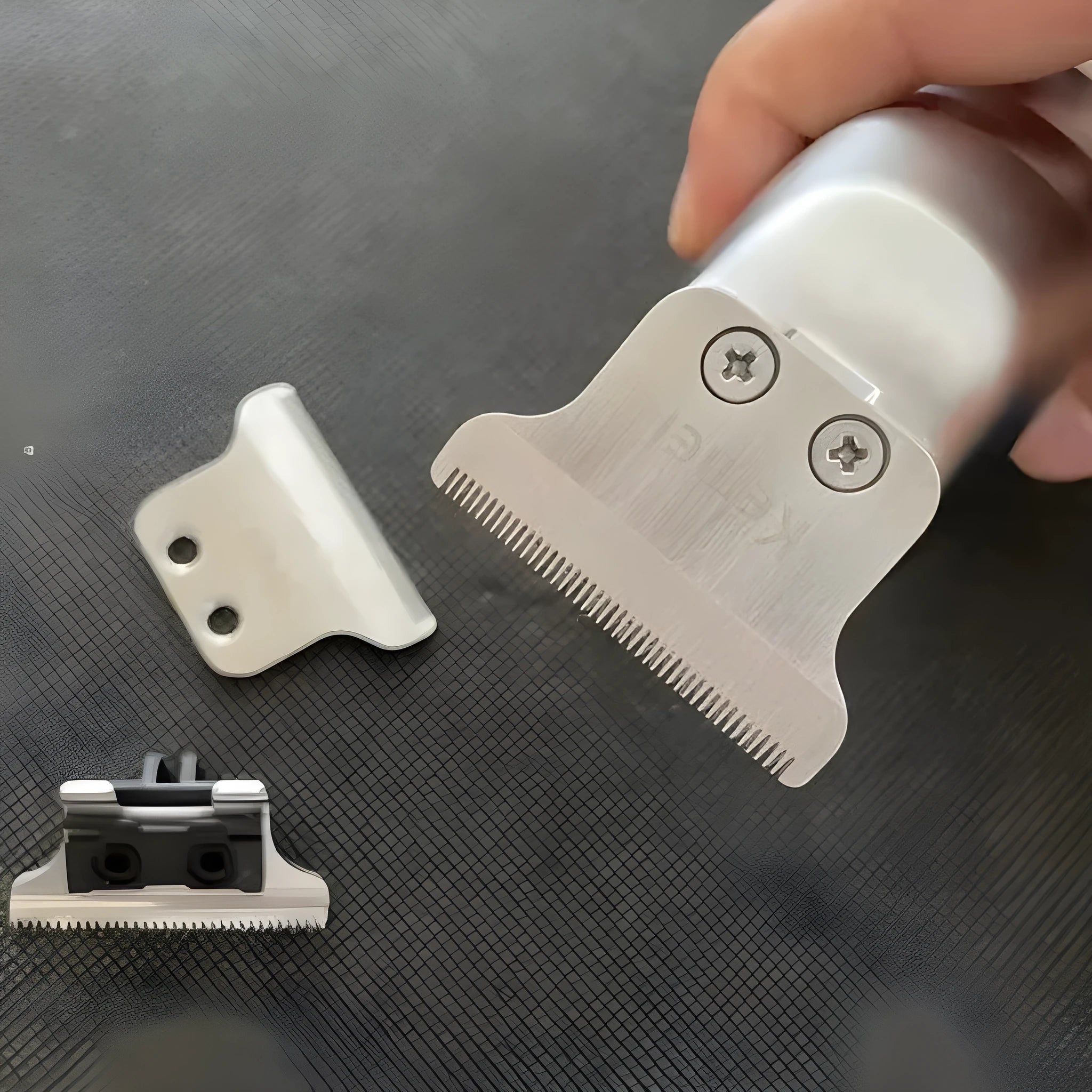 Barber scissors with LCD display showing rechargeable KM-5027 model with stainless steel tool head