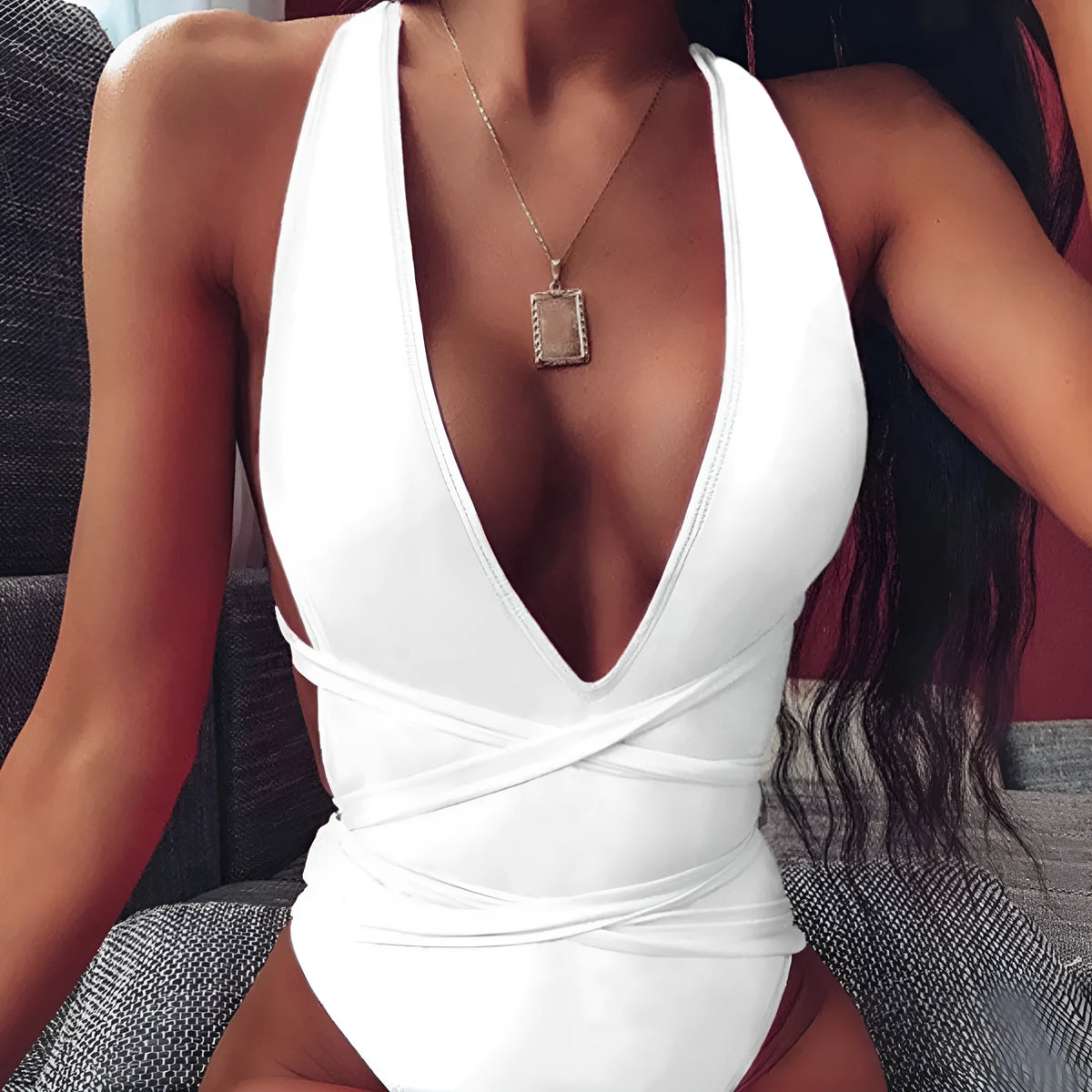Women's one-piece swimsuit with lace-up front, deep V backless design and high-waist fit in solid colour