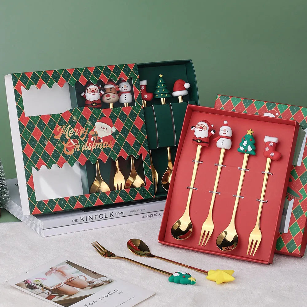 Red-handled Christmas spoon and fork set with tree, snowman, Santa, reindeer and stocking designs