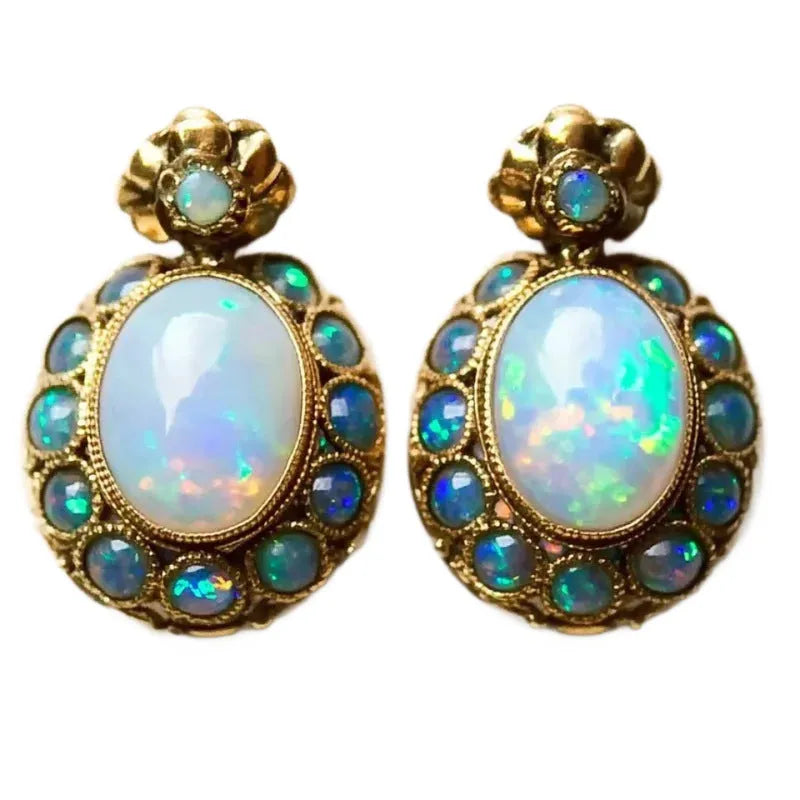 Gold-colour coloured gems earrings with geometric sunflower shape and inlaid gem setting, one pair
