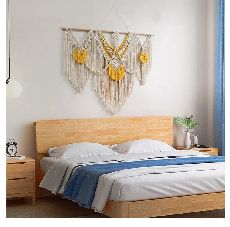 Hand-woven creamy-white cotton tapestry with rectangular shape measuring 120 by 95cm showing textured Nordic design