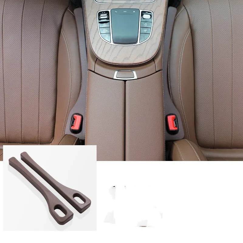 Two waterproof polyresin car seat gap filler strips with handles in beige colour