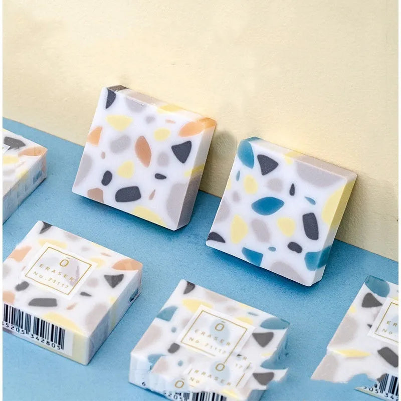Super Clean Traceless rubber eraser with a brick shape for student stationery.