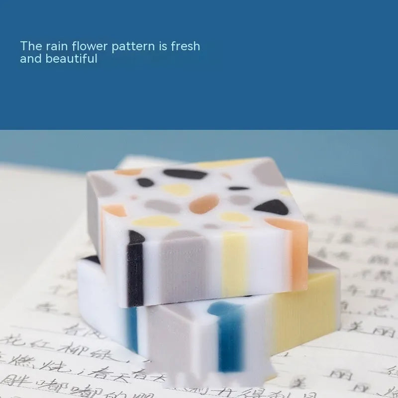 Super Clean Traceless rubber eraser with a brick shape for student stationery.