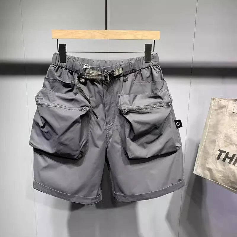 Men's black workwear shorts with loose fit, pockets, and non-ironing fabric, sized for waists up to 115kg