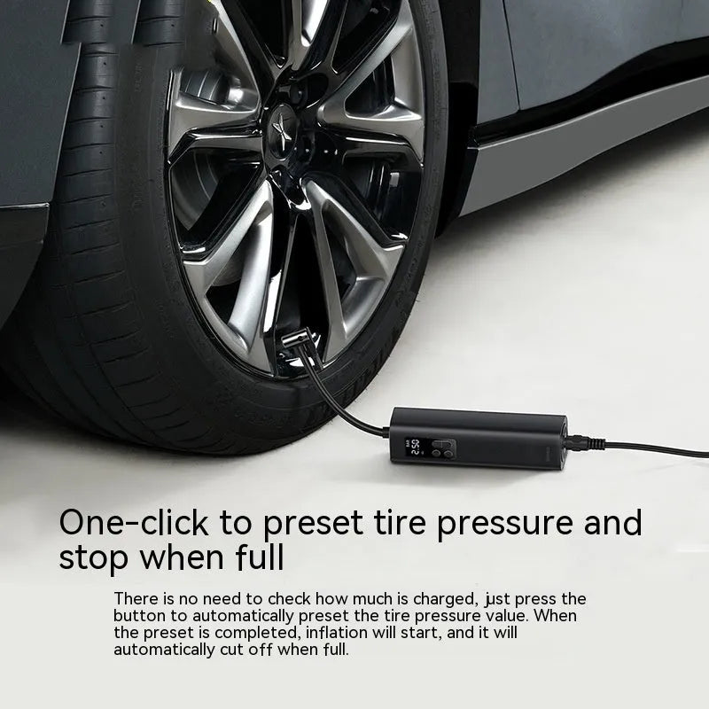 Black digital car tyre inflator with LCD display showing pressure readings, compact design with 18cm hose
