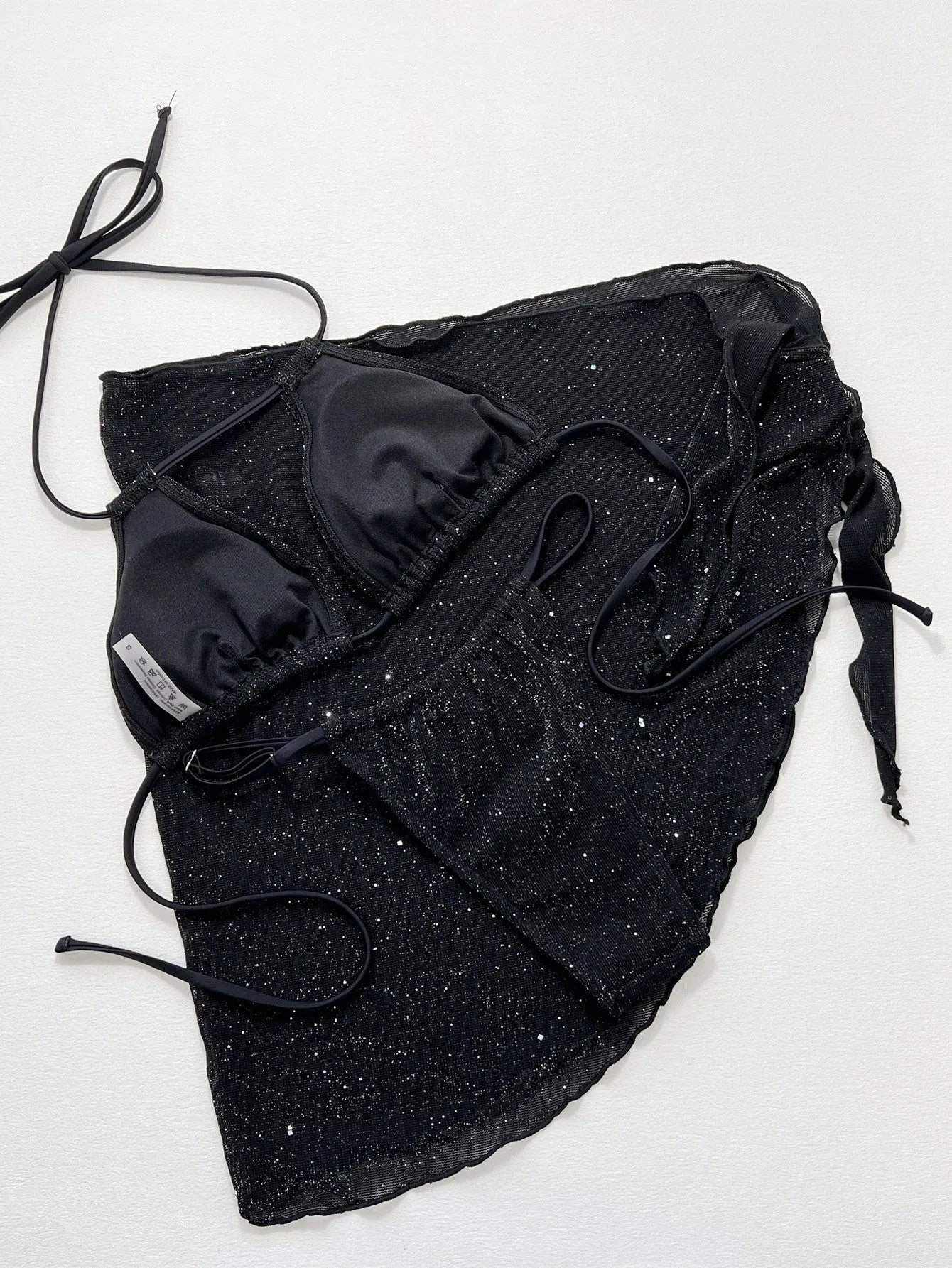 Black three-piece swimsuit set with top and shorts in polyester fibre, showing Asian sizing specifications