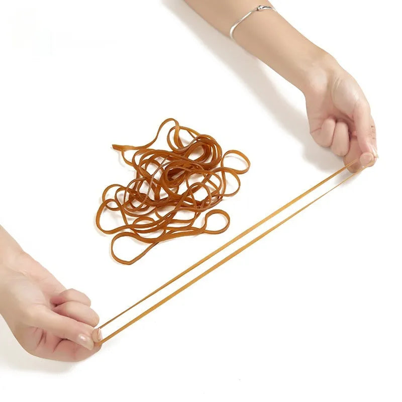 Natural rubber circular elastic bands in natural tan colour, supplied in 500g bag for sustainable bundling