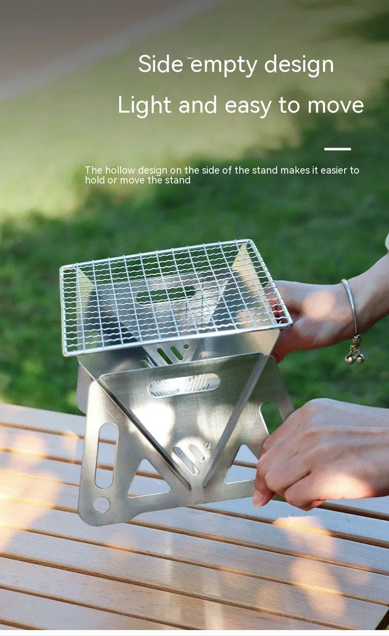 Outdoor folding stainless steel burning oven with BBQ grill and storage bag for portable barbecuing