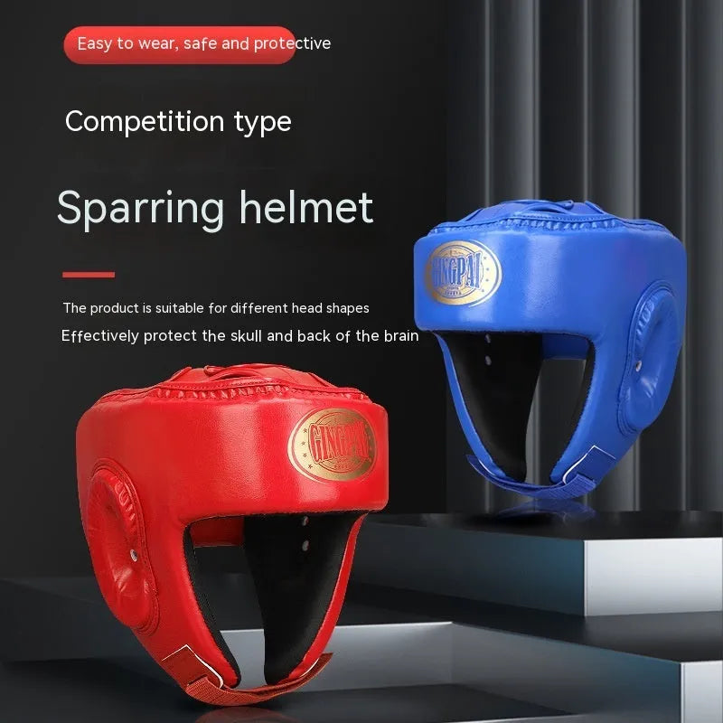 Red fully enclosed boxing helmet with jaw protection showing vertical ventilation design