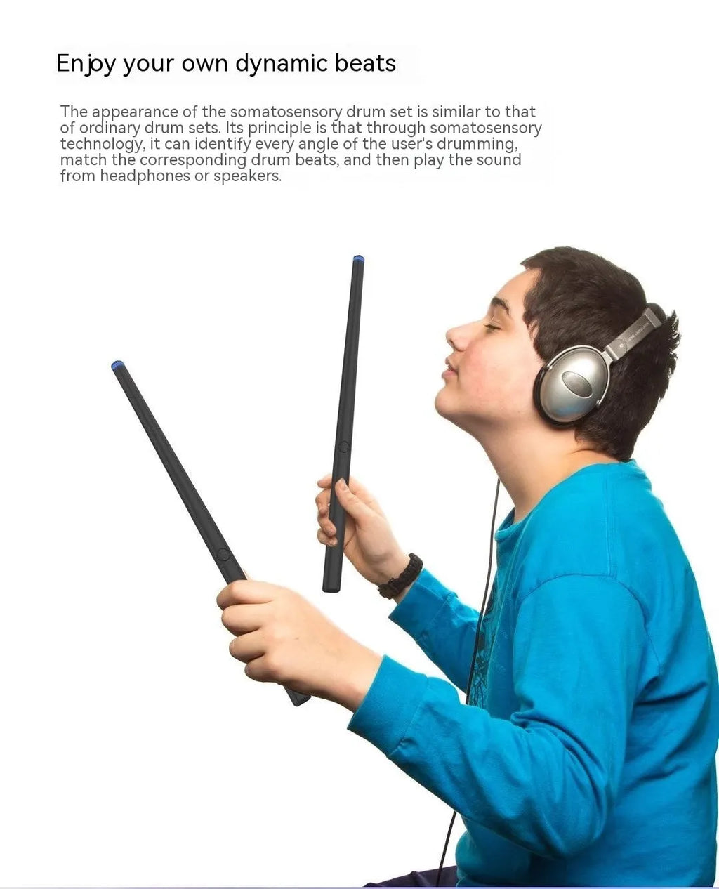 Black wireless air drum kit with drumsticks and foam floor markers for virtual reality music creation