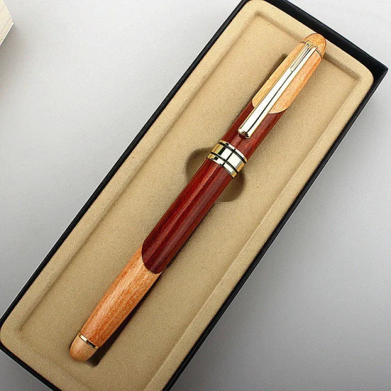Wooden fountain pen with metal accents and a matching fabric pen bag.