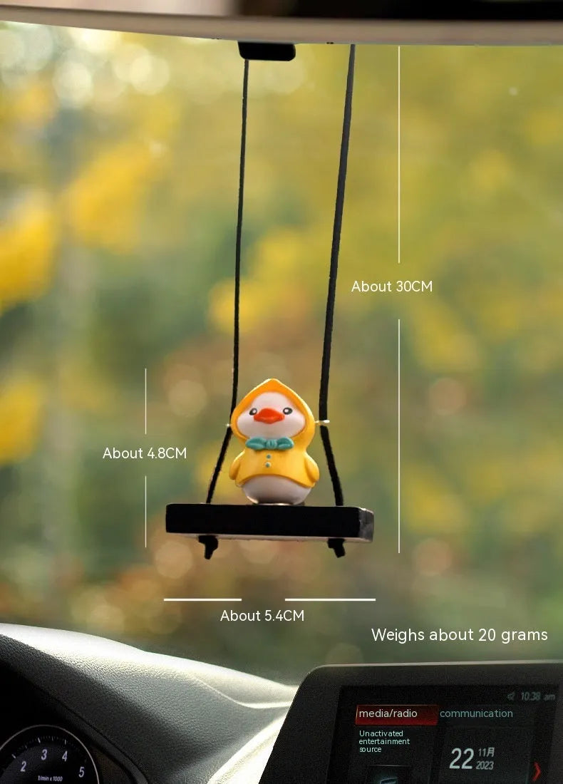 Cute yellow cartoon duck doll car hanging ornament in four design variations.