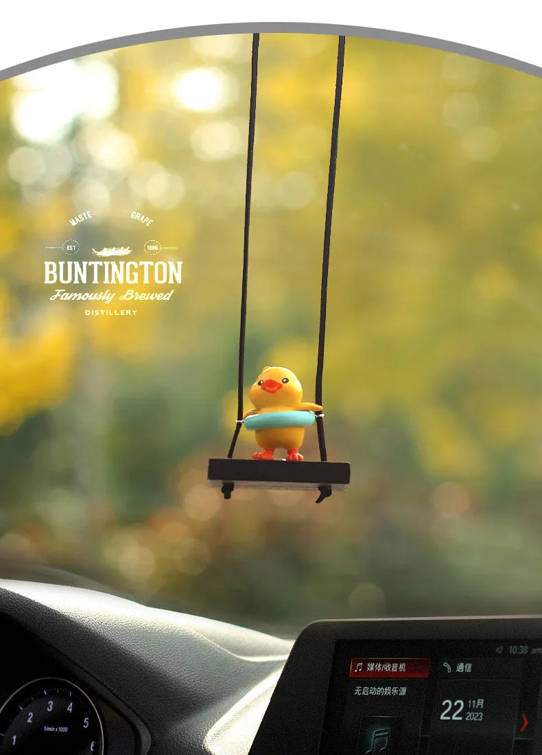 Cute yellow cartoon duck doll car hanging ornament in four design variations.