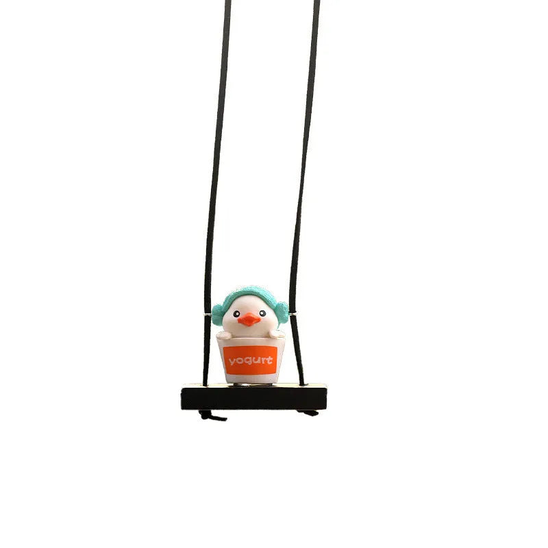Cute yellow cartoon duck doll car hanging ornament in four design variations.