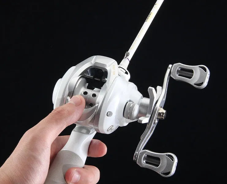 Small white micro bait casting fishing reel with drip wheel mechanism for freshwater angling