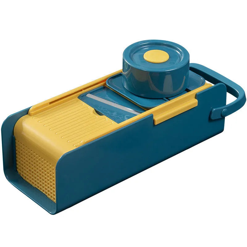 27cm hand-push vegetable cutter with stainless steel blades and protective guard on countertop