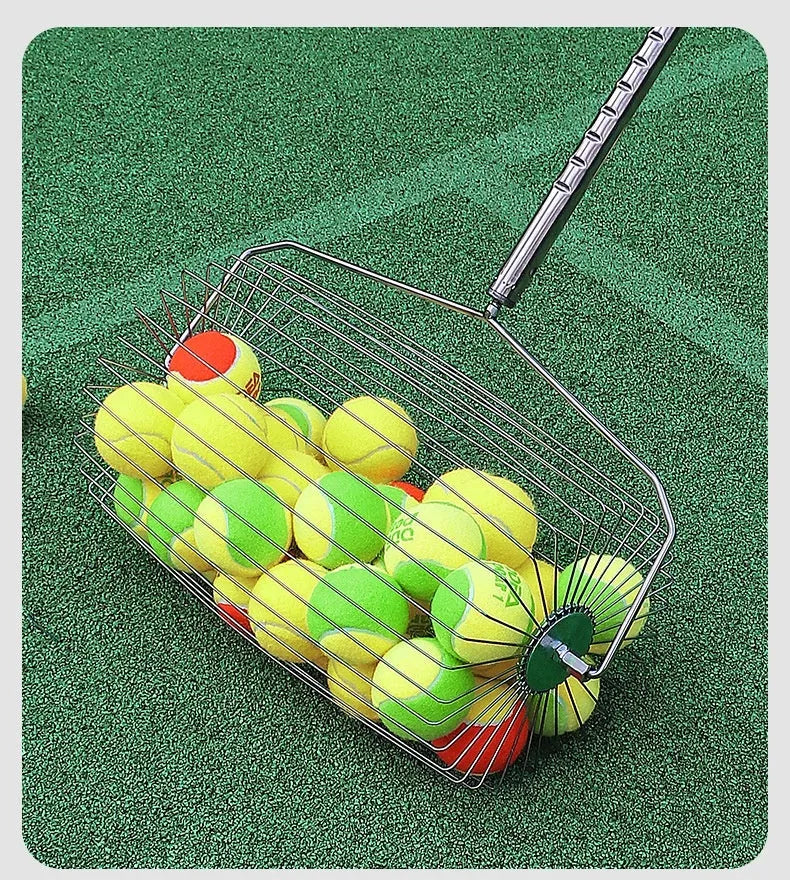 Stainless steel rolling tennis ball picker on a court, showing large adjustable frame.