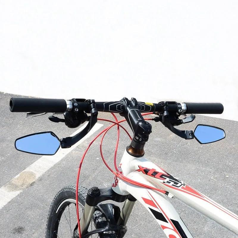 Black rotatable rearview mirror for mountain bike handlebars made of PMMA acrylic.