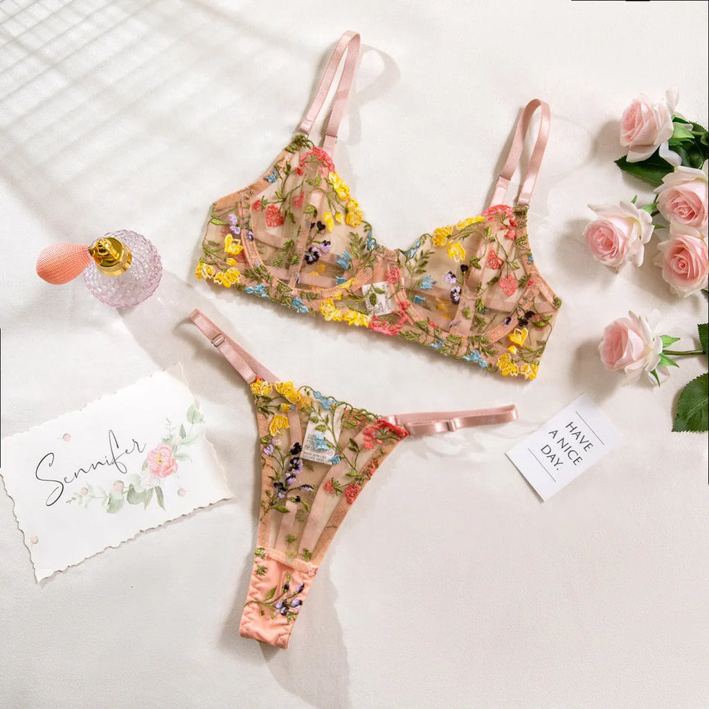 Women's floral style polyester bikini underwear set in multiple solid colours.