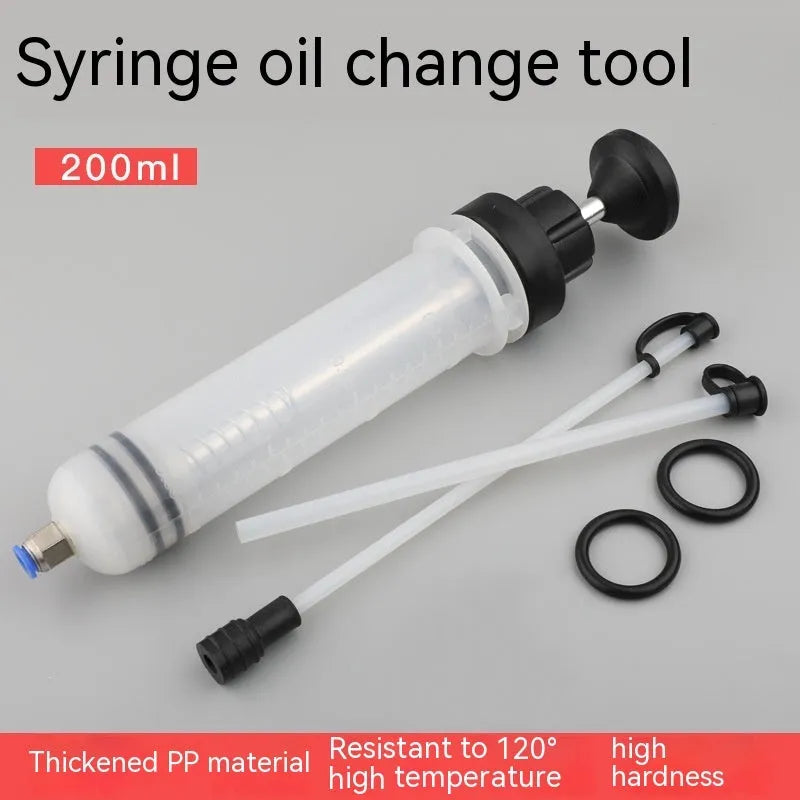 Manual oil change pump tool with syringe design for suction and injection of fluids