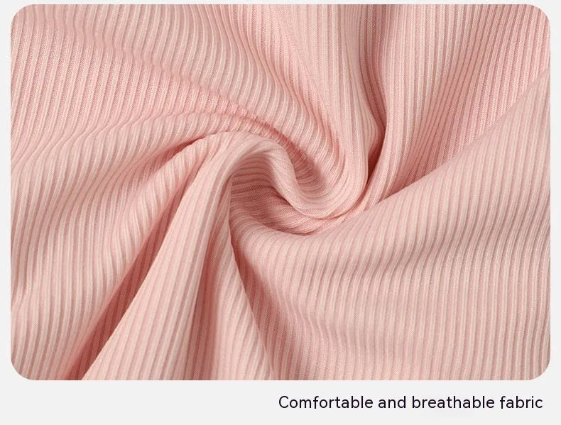 A pink women's conservative one-piece swimsuit on a white background.