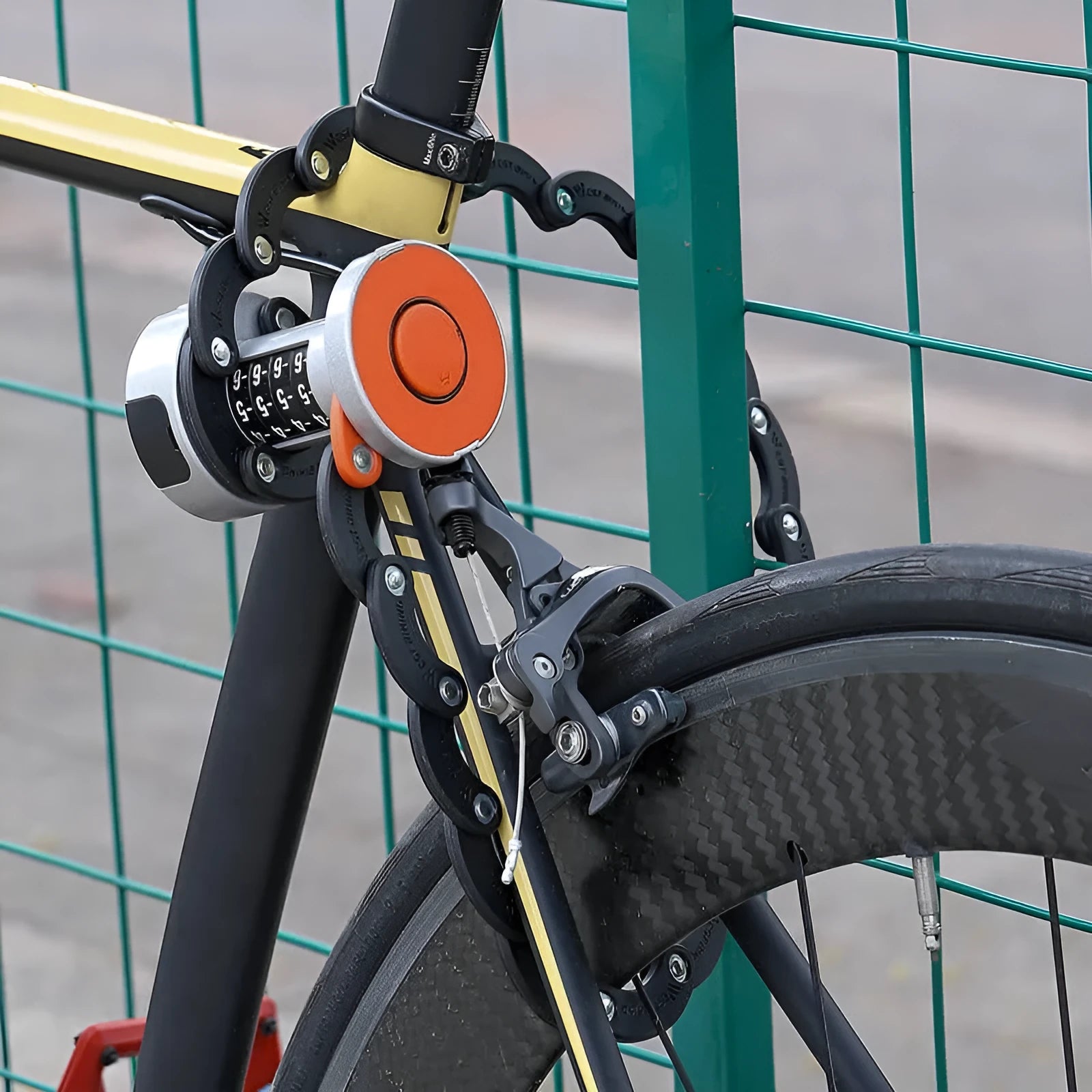 Portable black and black orange bicycle folding lock with a modern design shown open and folded.