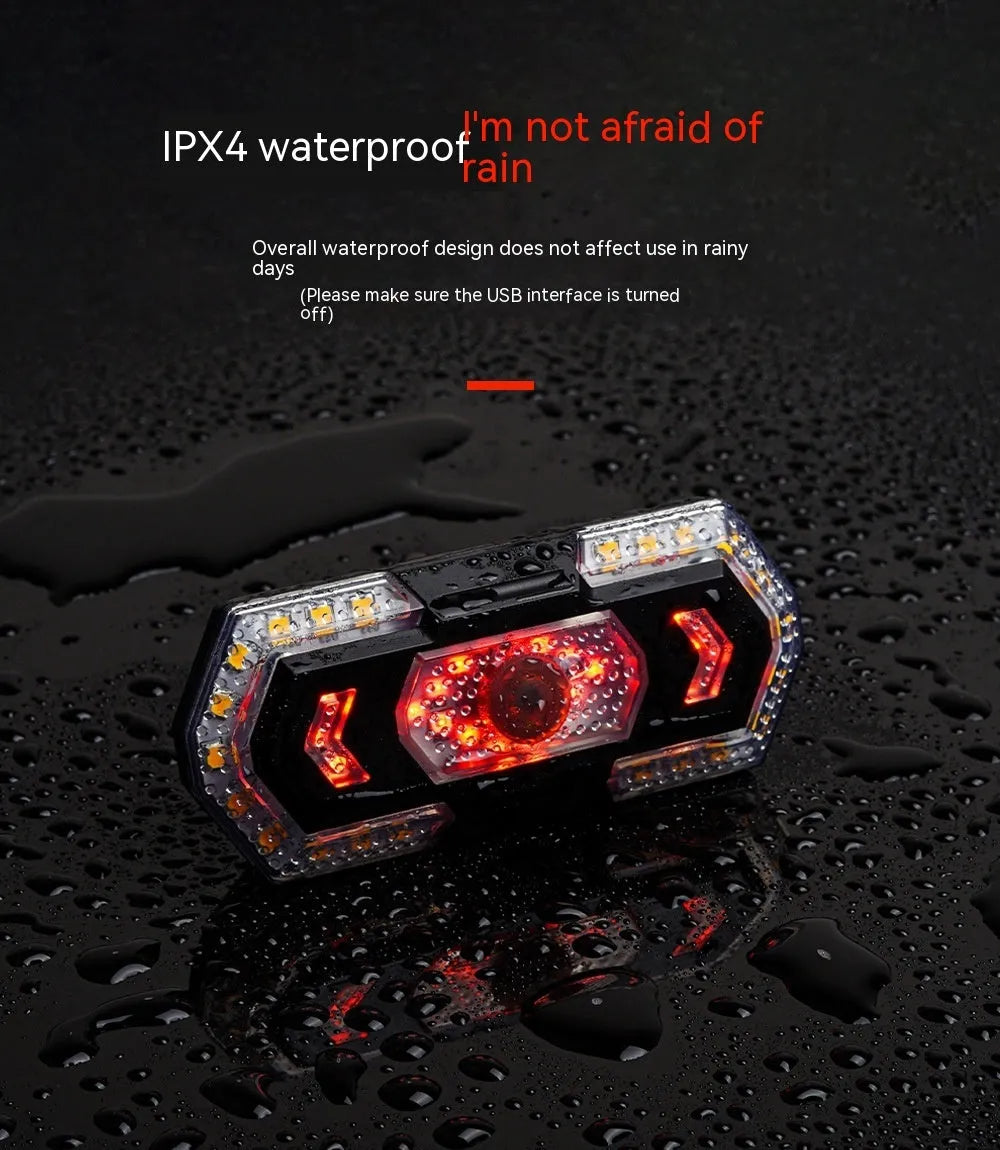 Black wireless remote control USB charging waterproof bicycle taillight with turn signals.