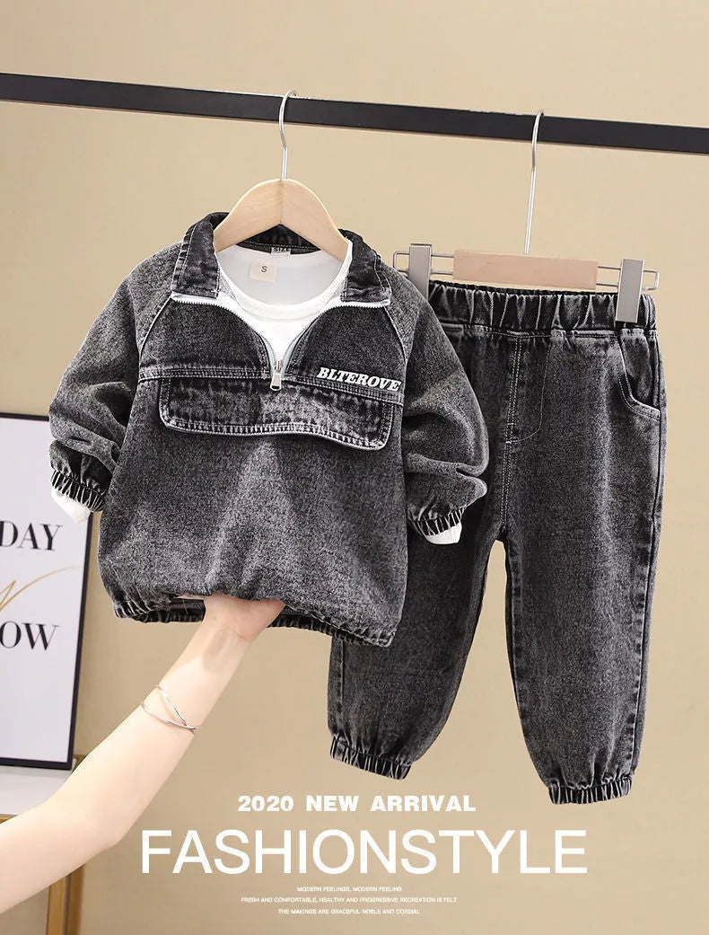 Boys' blue denim two-piece suit set with long sleeves, showing top and trousers laid flat.
