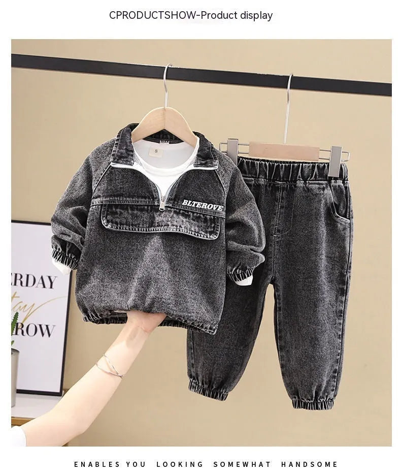 Boys' blue denim two-piece suit set with long sleeves, showing top and trousers laid flat.