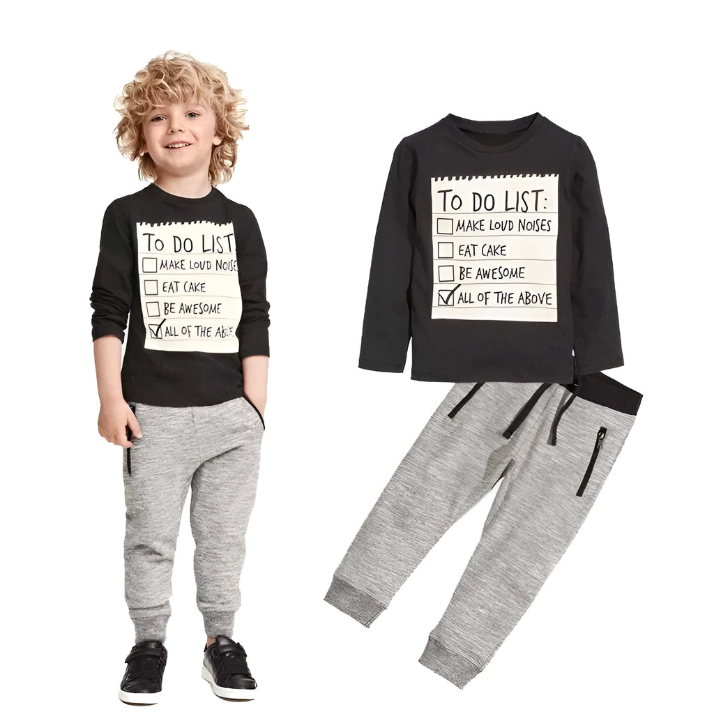A boys' casual cotton two-piece clothing set with a long-sleeved letter-print t-shirt and matching pants.