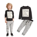 A boys' casual cotton two-piece clothing set with a long-sleeved letter-print t-shirt and matching pants.