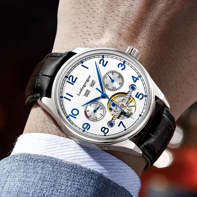 Men's stainless steel mechanical watch with sapphire crystal glass and genuine leather strap showing transparent case back