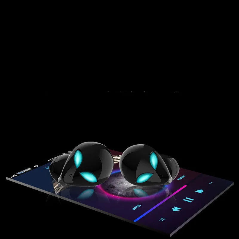 Creative Outer T8 Starman Bluetooth headset with alien design, wireless charging case, and 10mm speakers in black or white