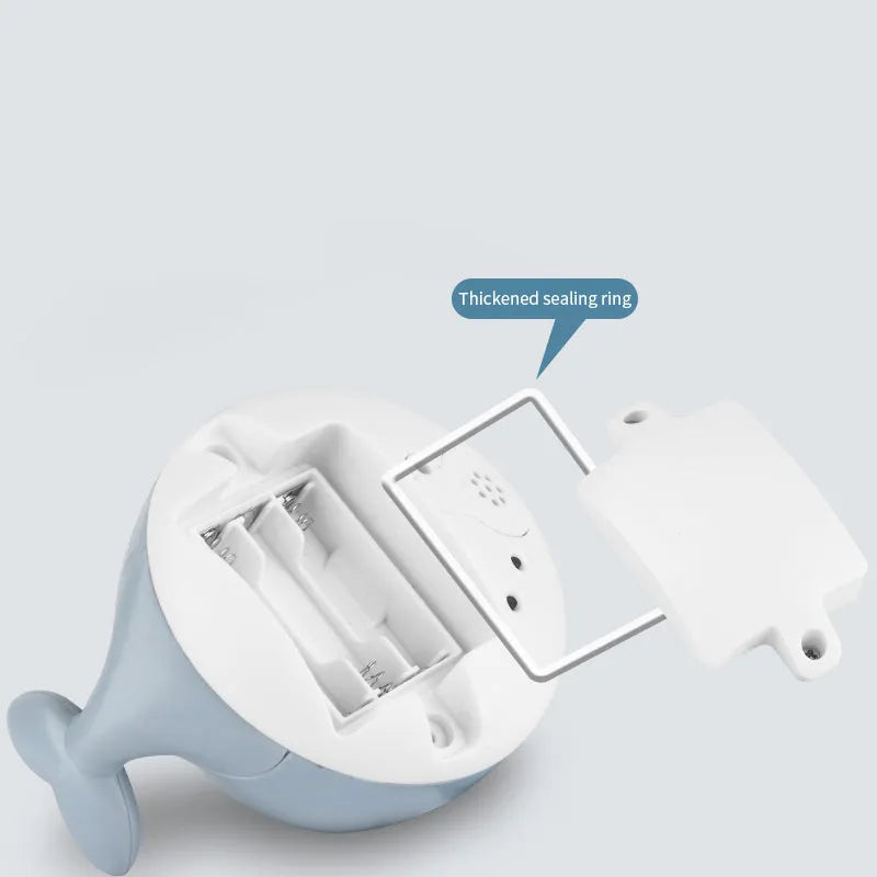 Electric induction whale spray bath toy with automatic water sensing, flashing light, and music functions