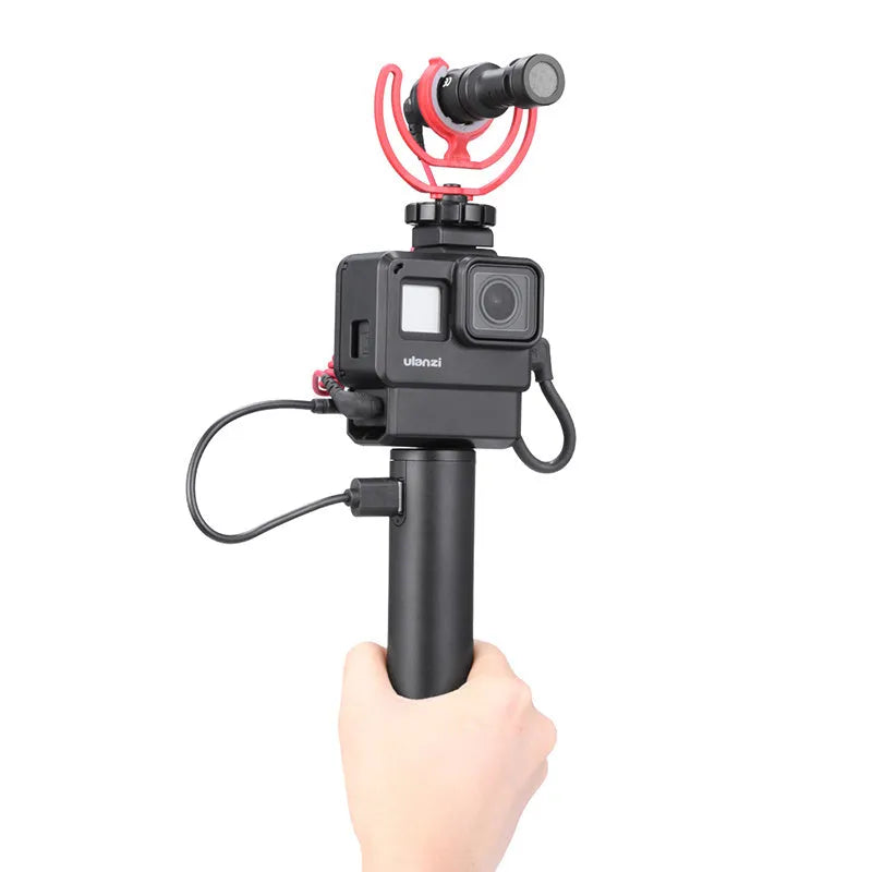 Black portable power bank with integrated handle showing 12.5cm length and 3.2cm width dimensions