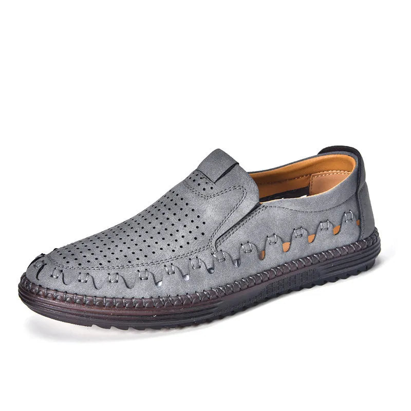 Men's brown slip-on leather shoes with round toe, low-top design, and hollowed-out details on artificial PU upper