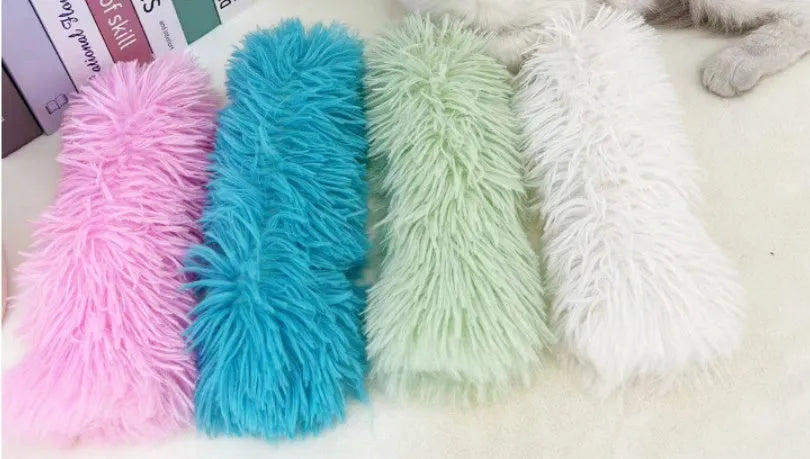 27cm by 10cm plush cat toy pillow in blue, green, pink, or white colour options